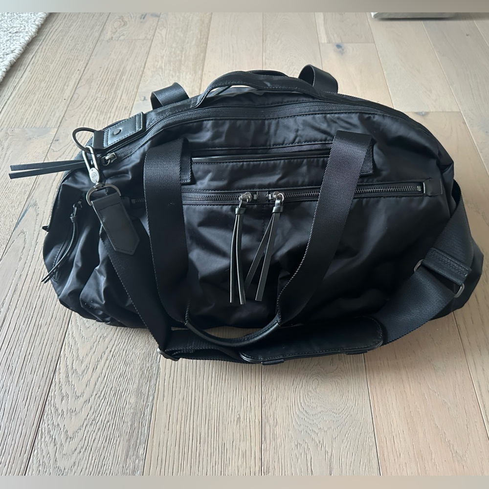 Lululemon black duffel bag with a beautiful blue interior